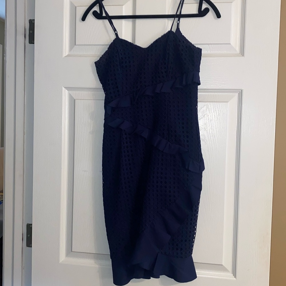 Navy islet midi dress. Adjustable straps. Zips in back